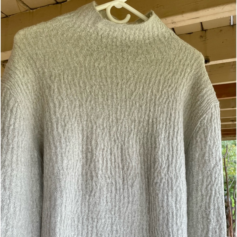 Mock turtleneck cream sweater
